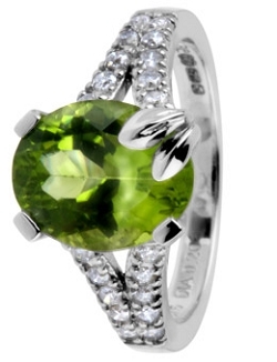 Description Specification of 9CT White Gold Peridot And Diamond Ring Description Specification of 9CT White Gold Peridot And Diamond Ring